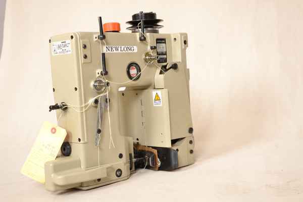 Фото объявления: Стационарная мешкозашивочная машина NEWLONG DS-9C с пневматическим приводом ножа (для промышленности). в Краснодаре