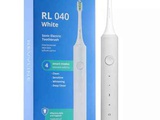 Белая зубная щетка Revyline RL040 с мощной батареей
